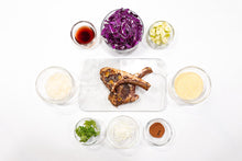 Load image into Gallery viewer, Lamb Chop Adobo w/ Creamy Polenta &amp; Braised Apple and Cabbage
